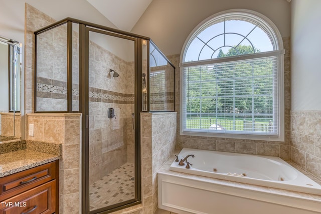 3 Chestnut Ridge Ct, Jonesborough, TN 37659 - bathroom featuring a whirlpool tub, a stall shower, vanity, and lofted ceiling