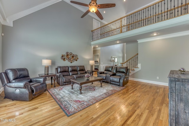 3 Chestnut Ridge Ct, Jonesborough, TN 37659 - living area featuring high vaulted ceiling, a ceiling fan, stairs, wood finished floors, and ornamental molding