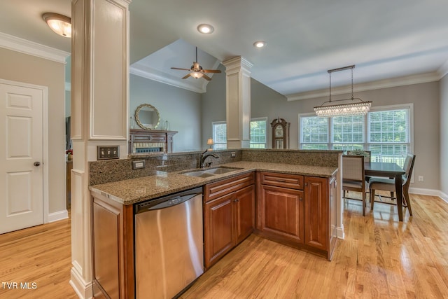 3 Chestnut Ridge Ct, Jonesborough, TN 37659 - kitchen featuring stainless steel dishwasher, brown cabinets, crown molding, dark stone counters, and plenty of natural light