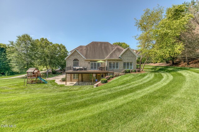 3 Chestnut Ridge Ct, Jonesborough, TN 37659 - rear view of property with a playground, brick siding, a yard, and a patio