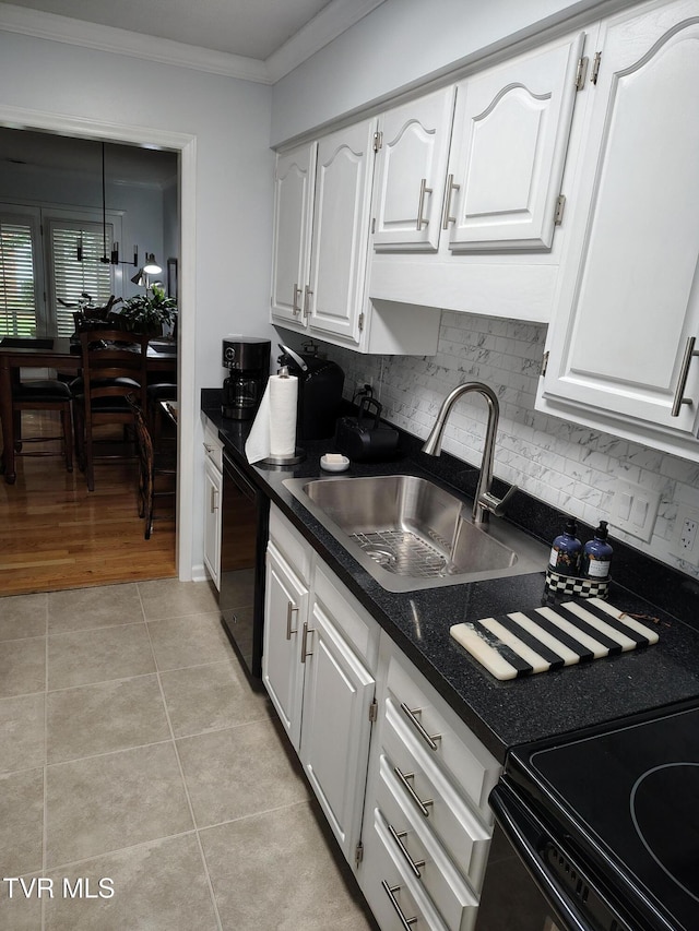 400 Sunset Dr Unit L56, Johnson City, TN 37604 - kitchen featuring crown molding, dark countertops, black appliances, white cabinetry, and light tile patterned floors