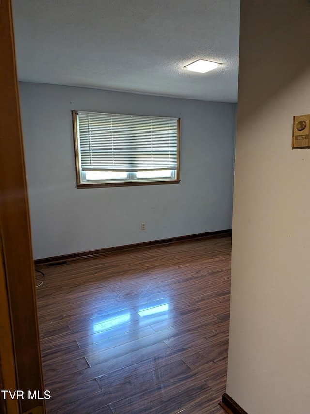 233 Pioneer Haven Ln, Kingsport, TN 37663 - spare room featuring wood finished floors and baseboards