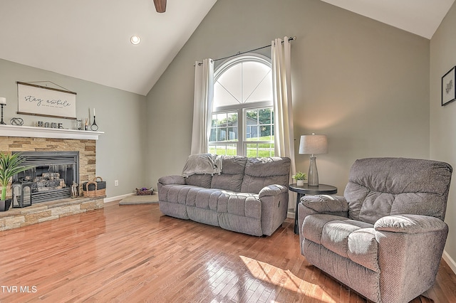 517 W Glade St, Glade Spring, VA 24340 - living area featuring high vaulted ceiling, wood finished floors, a fireplace, and recessed lighting