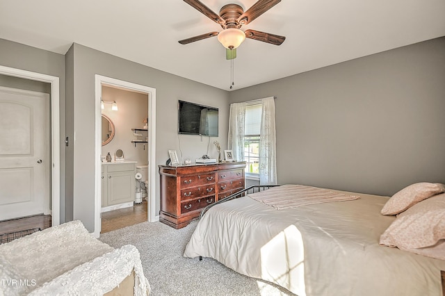 517 W Glade St, Glade Spring, VA 24340 - carpeted bedroom featuring ensuite bathroom, ceiling fan, and tile patterned flooring