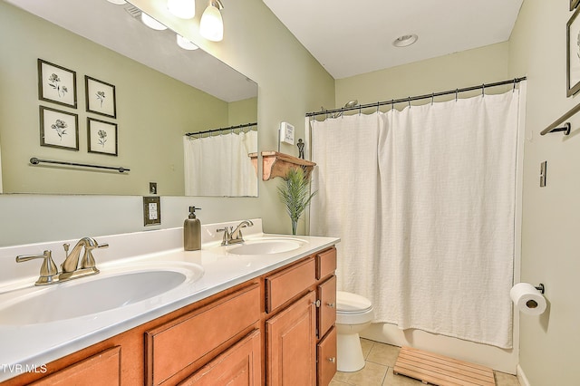 517 W Glade St, Glade Spring, VA 24340 - bathroom with tile patterned floors, double vanity, and shower / bathtub combination with curtain