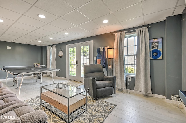 517 W Glade St, Glade Spring, VA 24340 - living area with plenty of natural light, light wood finished floors, french doors, recessed lighting, and a paneled ceiling