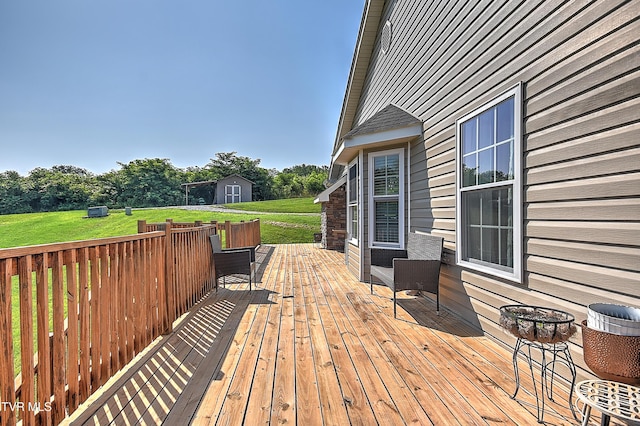 517 W Glade St, Glade Spring, VA 24340 - deck featuring a lawn and a storage unit