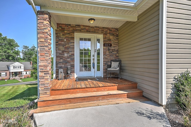 517 W Glade St, Glade Spring, VA 24340 - view of exterior entry featuring covered porch and stone siding