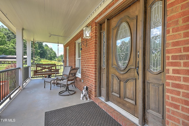 22643 Twin Oaks Rd, Abingdon, VA 24211 - doorway to property featuring a porch and brick siding