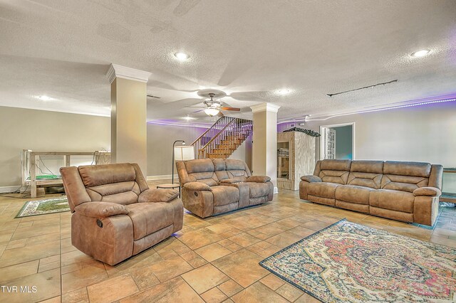 22643 Twin Oaks Rd, Abingdon, VA 24211 - living area with crown molding, a ceiling fan, a textured ceiling, stairs, and recessed lighting