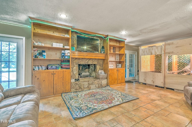 22643 Twin Oaks Rd, Abingdon, VA 24211 - living area featuring a textured ceiling and a fireplace