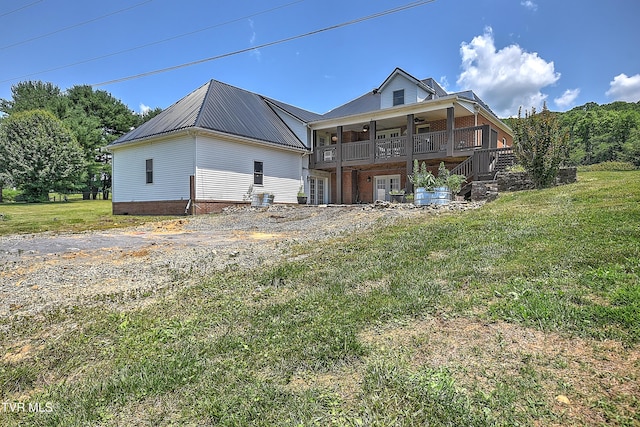 22643 Twin Oaks Rd, Abingdon, VA 24211 - rear view of house featuring a yard, a metal roof, and brick siding
