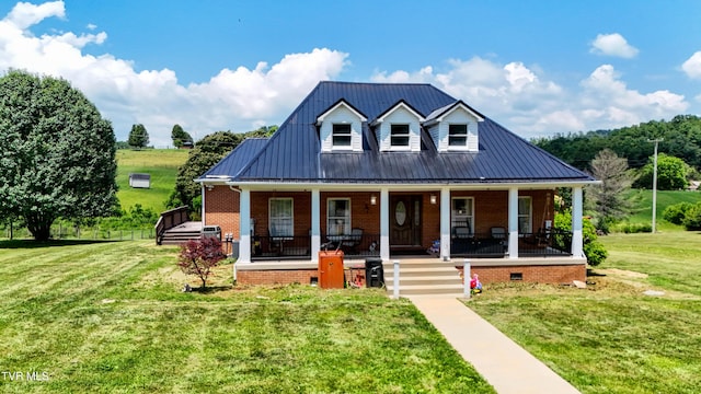 22643 Twin Oaks Rd, Abingdon, VA 24211 - view of front of house featuring a metal roof, brick siding, a front yard, and a porch