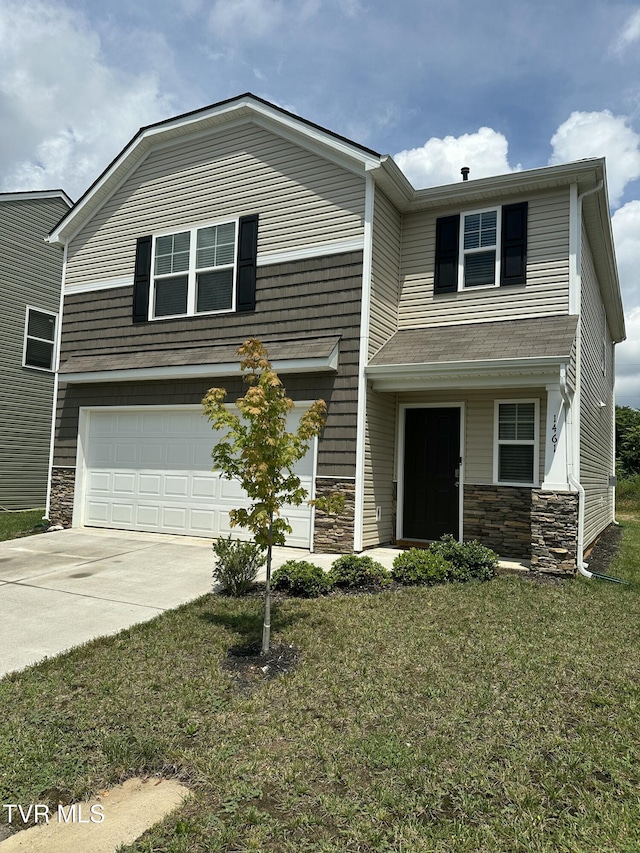 1461 Gress Mag Mtn, Kingsport, TN 37660 - view of front of house featuring stone siding, an attached garage, and a front yard