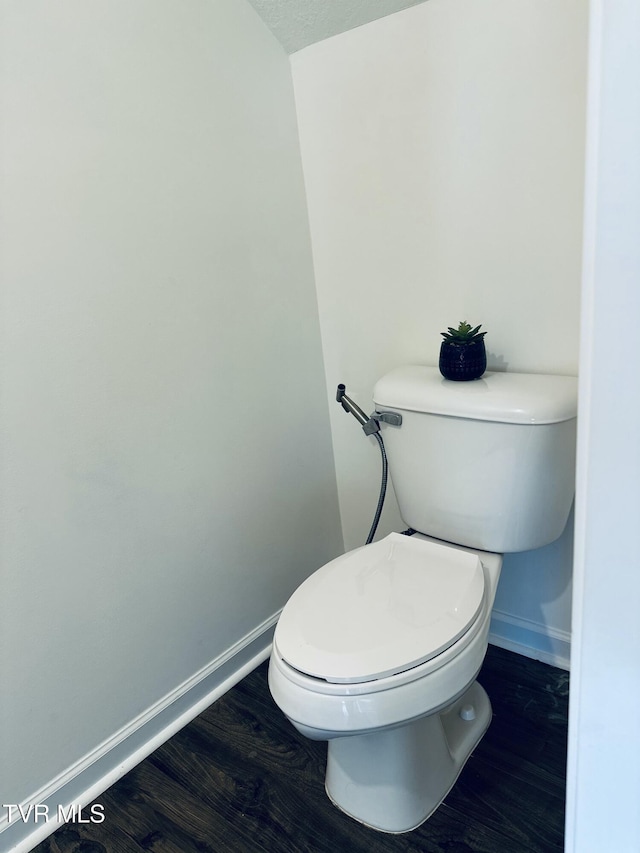 1461 Gress Mag Mtn, Kingsport, TN 37660 - bathroom with baseboards and wood finished floors