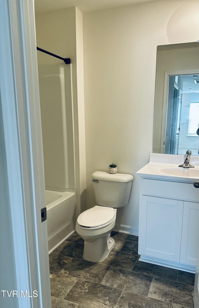 1461 Gress Mag Mtn, Kingsport, TN 37660 - full bath with vanity, stone finish floors, and bathtub / shower combination