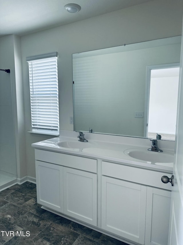 1461 Gress Mag Mtn, Kingsport, TN 37660 - bathroom featuring double vanity and stone finish floors