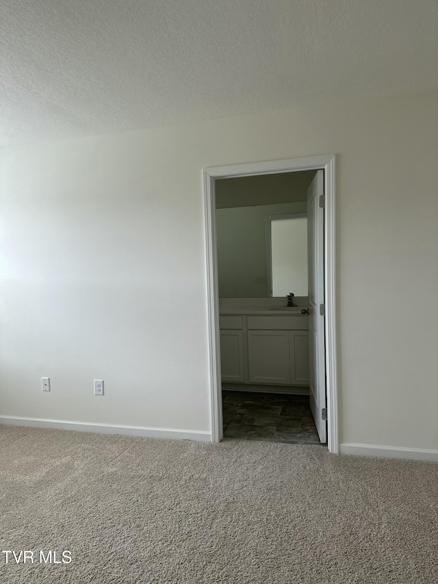 1461 Gress Mag Mtn, Kingsport, TN 37660 - unfurnished bedroom with dark colored carpet and a textured ceiling