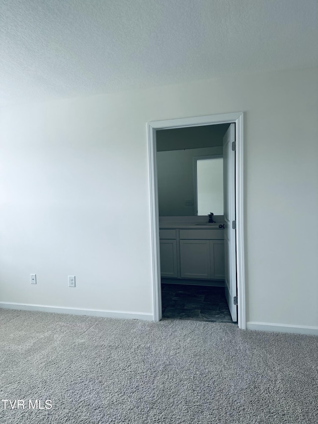 1461 Gress Mag Mtn, Kingsport, TN 37660 - unfurnished bedroom with dark carpet and a textured ceiling