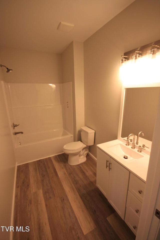 1524 Brown Ave, Jefferson City, TN 37760 - bathroom featuring vanity, wood finished floors, and shower / tub combination