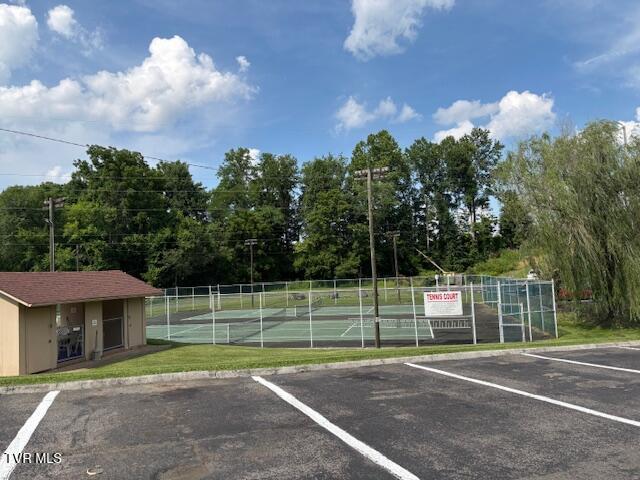 1145 Carriage Cir Unit 204, Bristol, VA 24201 - uncovered parking lot with a tennis court