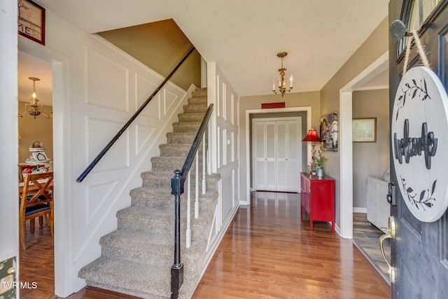 5116 Waterford Dr, Kingsport, TN 37664 - foyer with a chandelier, stairs, and wood finished floors