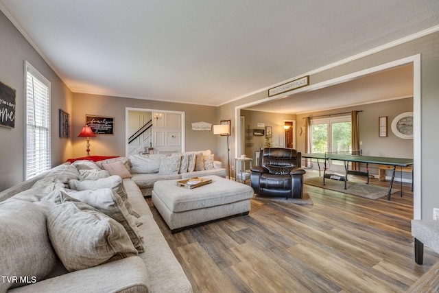 5116 Waterford Dr, Kingsport, TN 37664 - living area featuring wood finished floors, stairs, and ornamental molding