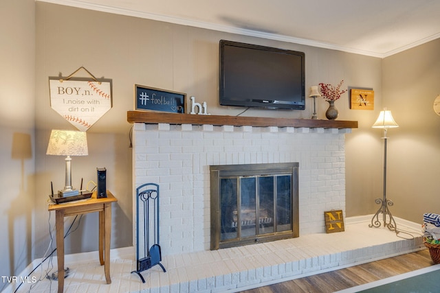 5116 Waterford Dr, Kingsport, TN 37664 - detailed view of ornamental molding, a brick fireplace, and wood finished floors