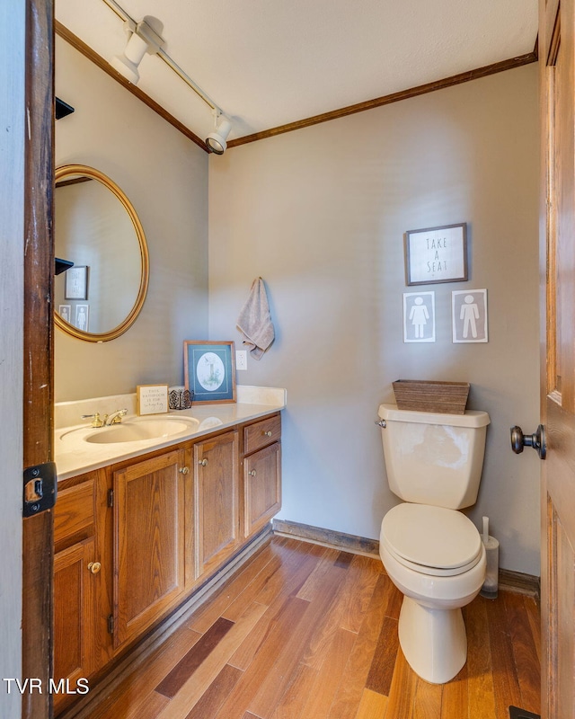 5116 Waterford Dr, Kingsport, TN 37664 - bathroom with ornamental molding, vanity, and wood finished floors