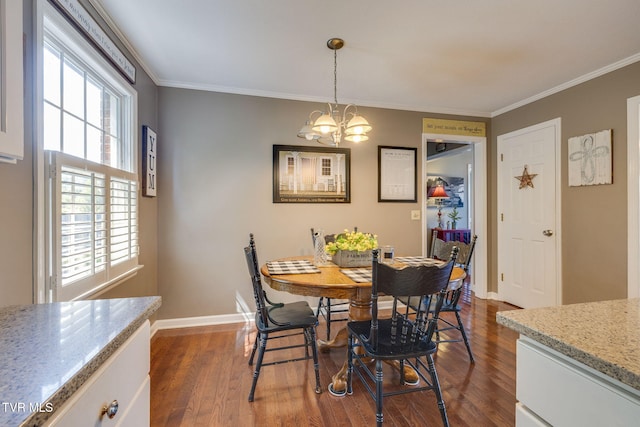 5116 Waterford Dr, Kingsport, TN 37664 - dining area featuring dark wood-type flooring, ornamental molding, and a chandelier