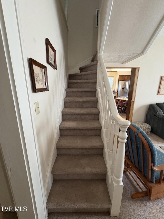 2572 May Rd, Talbott, TN 37877 - stairway featuring carpet