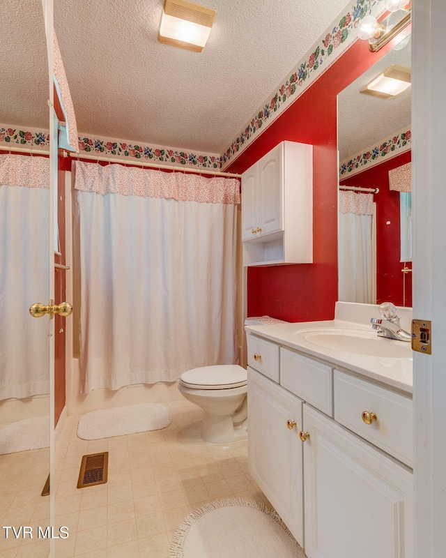811 Fain Ave Unit 811, Kingsport, TN 37660 - bathroom with a textured ceiling, vanity, and shower / bathtub combination with curtain