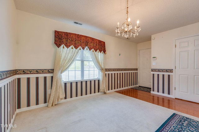 811 Fain Ave Unit 811, Kingsport, TN 37660 - carpeted spare room featuring a chandelier and a textured ceiling