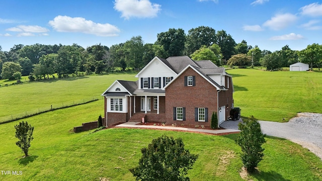 1251 Harmony Rd, Jonesborough, TN 37659 - traditional home featuring driveway, a garage, and brick siding