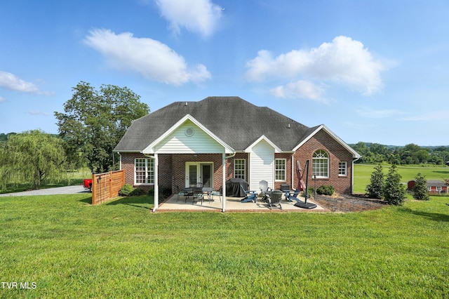 1251 Harmony Rd, Jonesborough, TN 37659 - rear view of property with brick siding, a patio area, a yard, and french doors