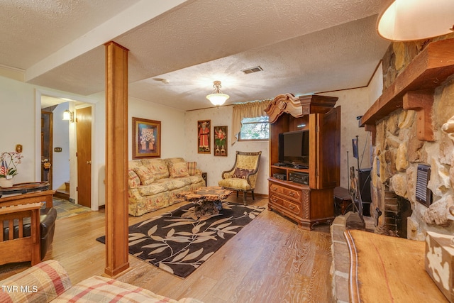 1049 Cooks Valley Rd, Kingsport, TN 37664 - living room with wood finished floors and a textured ceiling