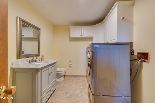 1049 Cooks Valley Rd, Kingsport, TN 37664 - laundry room with washer / clothes dryer and light tile patterned floors