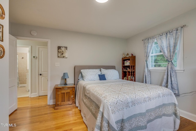 210 Anderson Rd, Johnson City, TN 37601 - bedroom with light wood-style flooring and baseboards