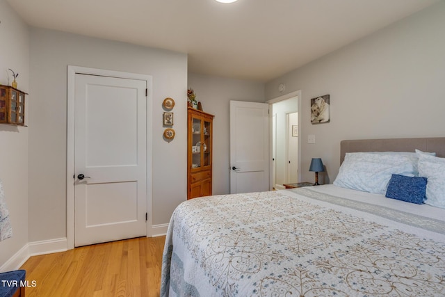 210 Anderson Rd, Johnson City, TN 37601 - bedroom with light wood-style floors and baseboards