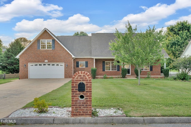 114 Wiltshire Dr, Gray, TN 37615 - view of front facade featuring driveway, brick siding, roof with shingles, and a garage