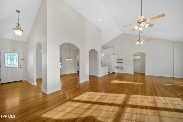 114 Wiltshire Dr, Gray, TN 37615 - entrance foyer with high vaulted ceiling, ceiling fan, light wood-type flooring, and arched walkways