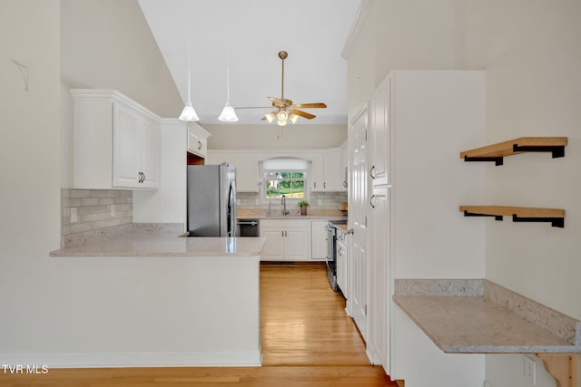 114 Wiltshire Dr, Gray, TN 37615 - kitchen with stainless steel fridge with ice dispenser, ceiling fan, open shelves, a peninsula, and light wood finished floors