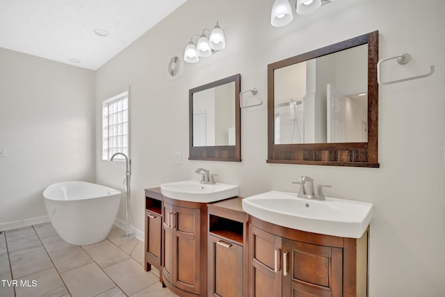 114 Wiltshire Dr, Gray, TN 37615 - full bath with two vanities and a freestanding bath