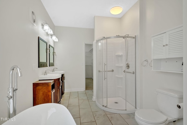 114 Wiltshire Dr, Gray, TN 37615 - full bathroom featuring a stall shower, vanity, marble finish flooring, a soaking tub, and a walk in closet