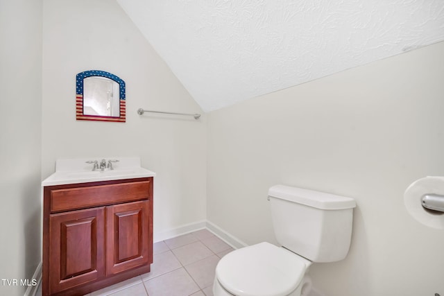 114 Wiltshire Dr, Gray, TN 37615 - half bath featuring vanity, vaulted ceiling, tile patterned floors, and a textured ceiling