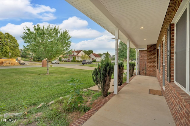 114 Wiltshire Dr, Gray, TN 37615 - view of grassy yard featuring covered porch