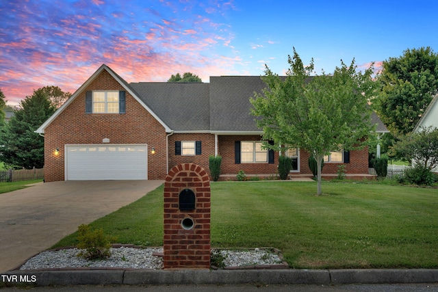 114 Wiltshire Dr, Gray, TN 37615 - view of front facade with driveway, brick siding, an attached garage, and a shingled roof