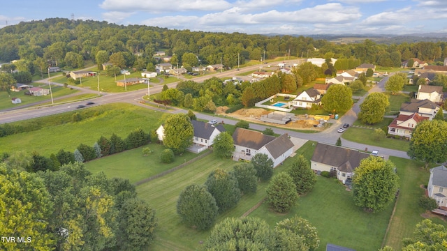 114 Wiltshire Dr, Gray, TN 37615 - aerial view of residential area with a heavily wooded area