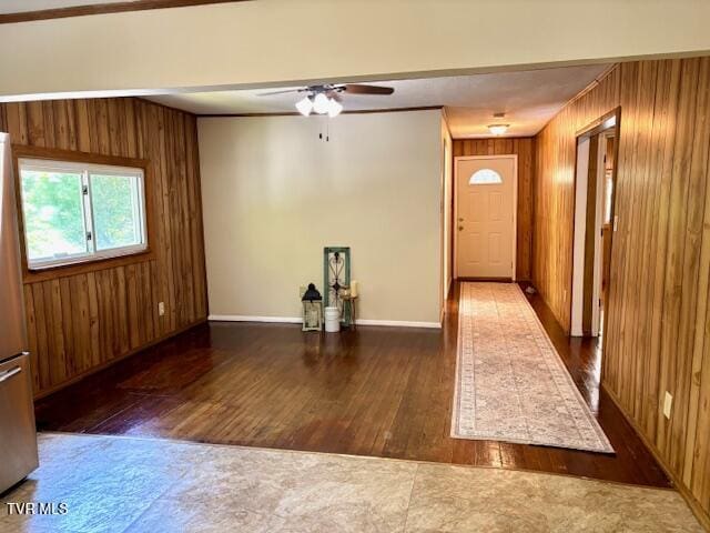 3219 Hardy Hollow Rd, Saint Paul, VA 24283 - foyer featuring wooden walls, wood finished floors, ceiling fan, and crown molding