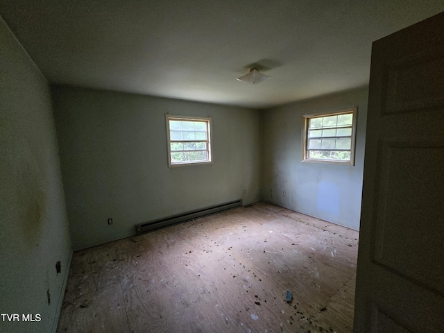 5875 Blue Springs Pkwy, Mosheim, TN 37818 - unfurnished room featuring a baseboard heating unit
